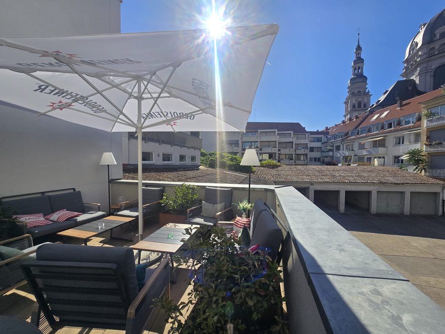The lounge corner of the terrace in the afternoon sun